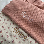 Embroidered headband with 'Simie' on a neutral background