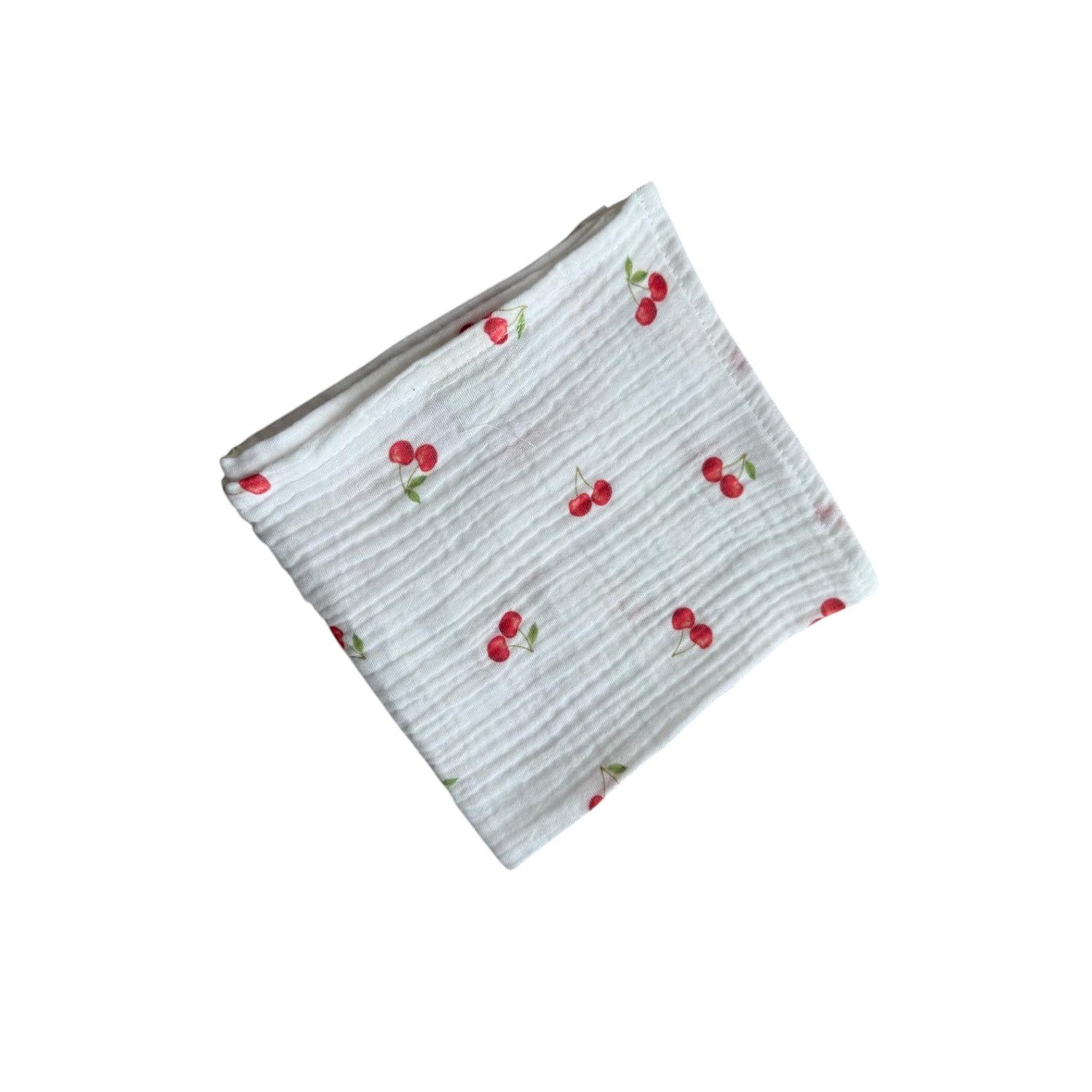 Baby Natur white muslin cloth with a red cherry print. Made from 100% cotton, perfect for babies.