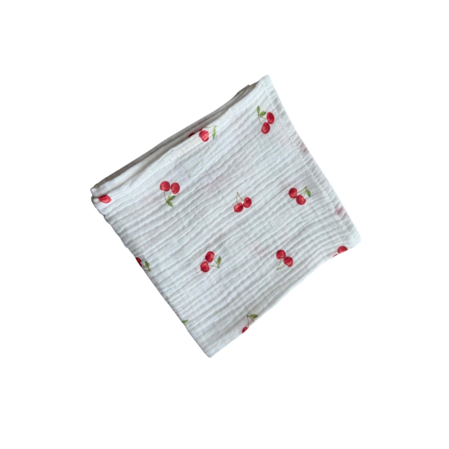 Baby Natur white muslin cloth with a red cherry print. Made from 100% cotton, perfect for babies.