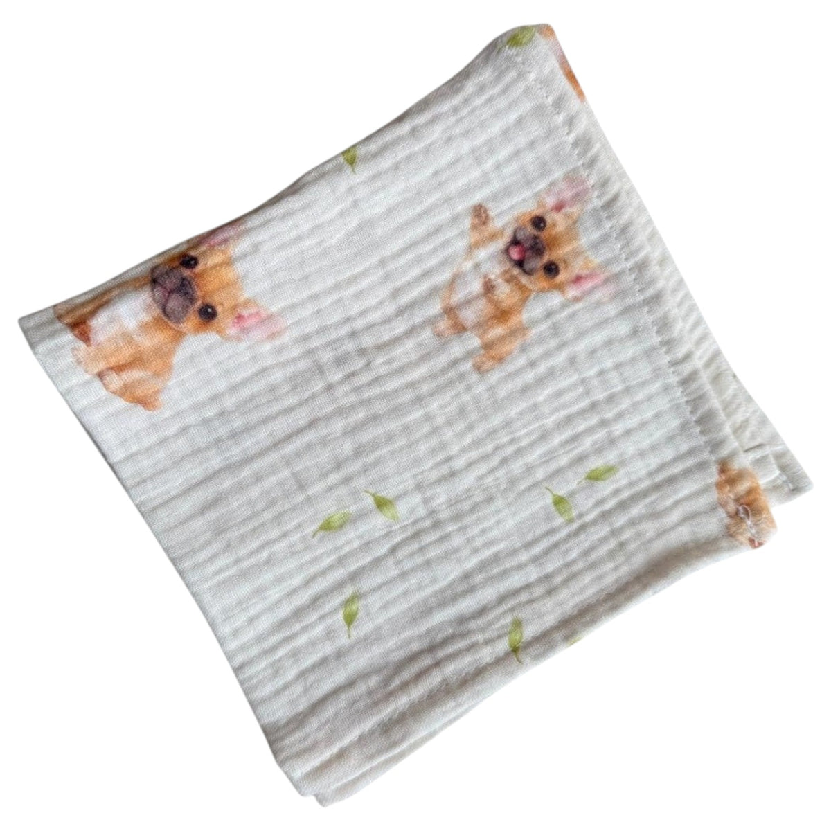 Baby Natur white 100% cotton muslin cloth with cute French bulldog print and green leaves.