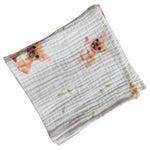Baby Natur white 100% cotton muslin cloth with cute French bulldog print and green leaves.