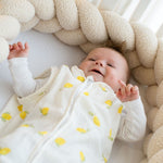 Baby Natur sleeveless sleeping bag with a lemon print, made from soft, breathable cotton for safe and comfortable sleep.