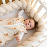 Baby Natur sleeveless sleeping bag in cream with a cute dog print, made from soft, breathable cotton for safe sleep.