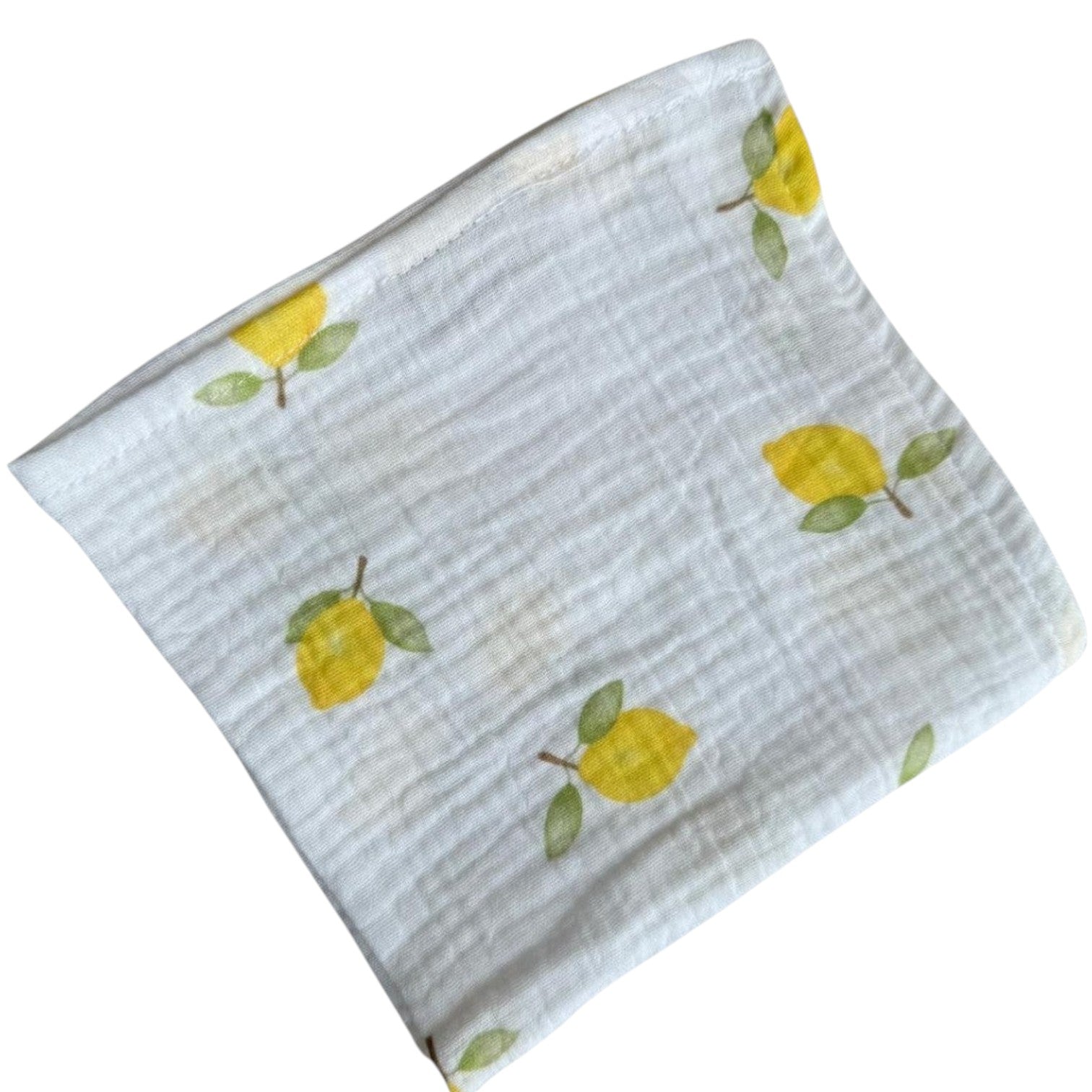 Baby Natur white muslin cloth with yellow lemon print, perfect for wiping and washing.
