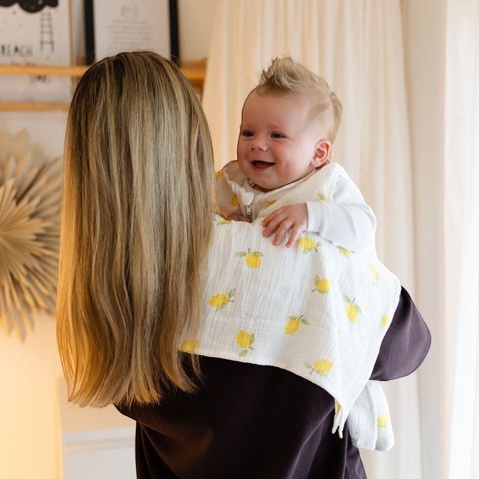 Baby Natur 100% cotton muslin swaddle blanket with yellow lemons pattern, for burping or as a crib liner.