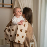 Baby NaturHere standard tetra diaper in cream with brown bear print, made of 100% cotton. Versatile for changing, burping, or bedding.